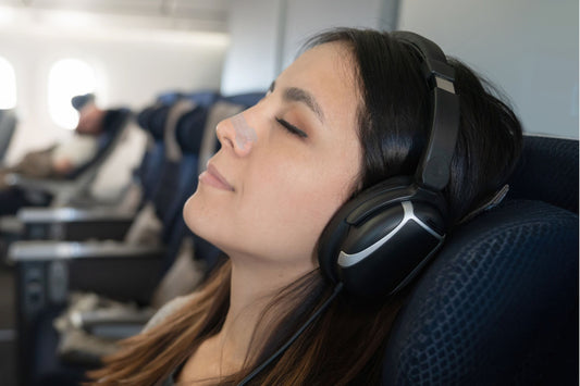 How to Sleep on a Plane: Tips for Beating Jet Lag
